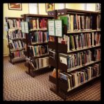 Library shelves with books