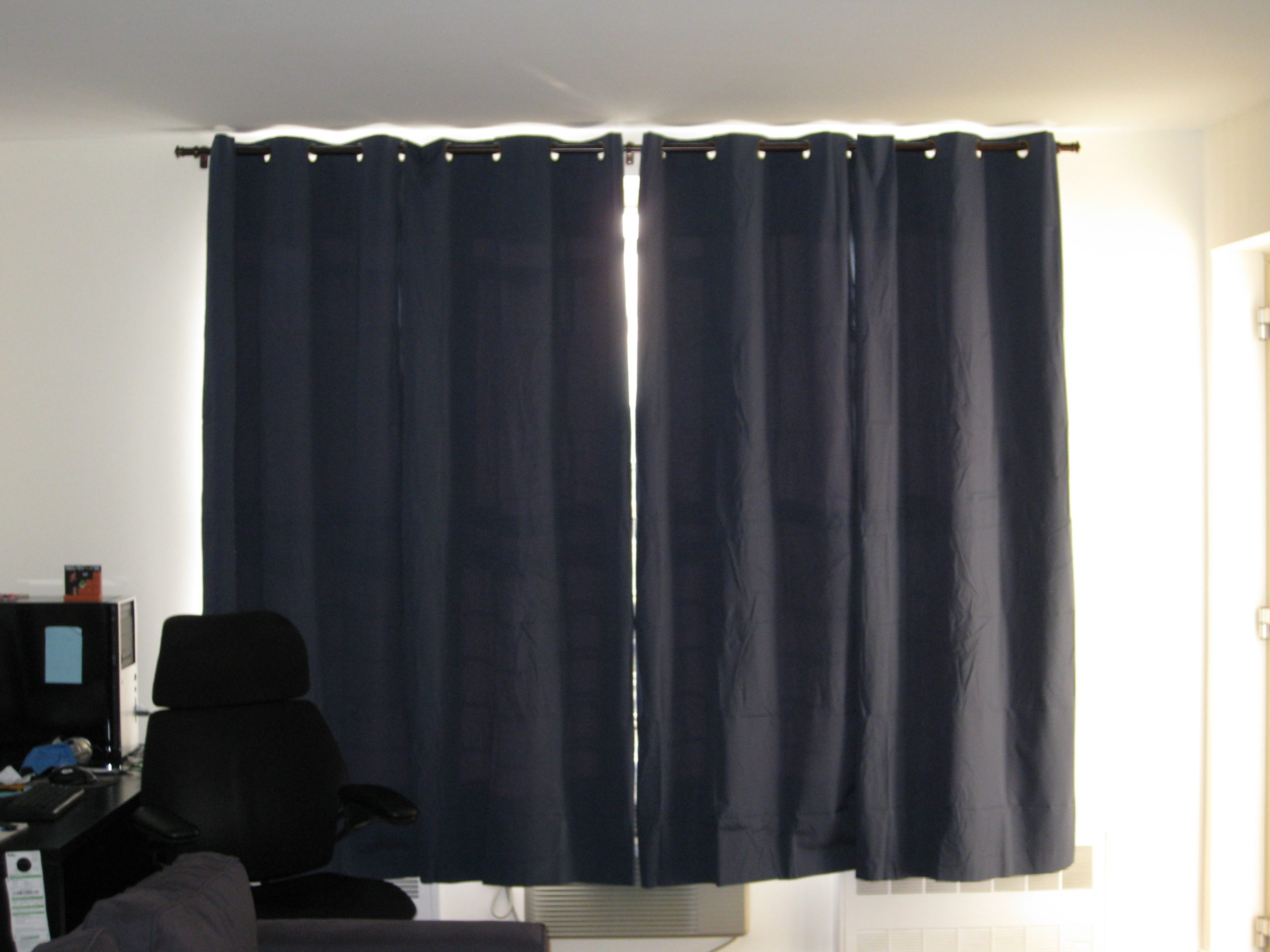 A black curtain on a window