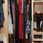 closet with hanging clothes